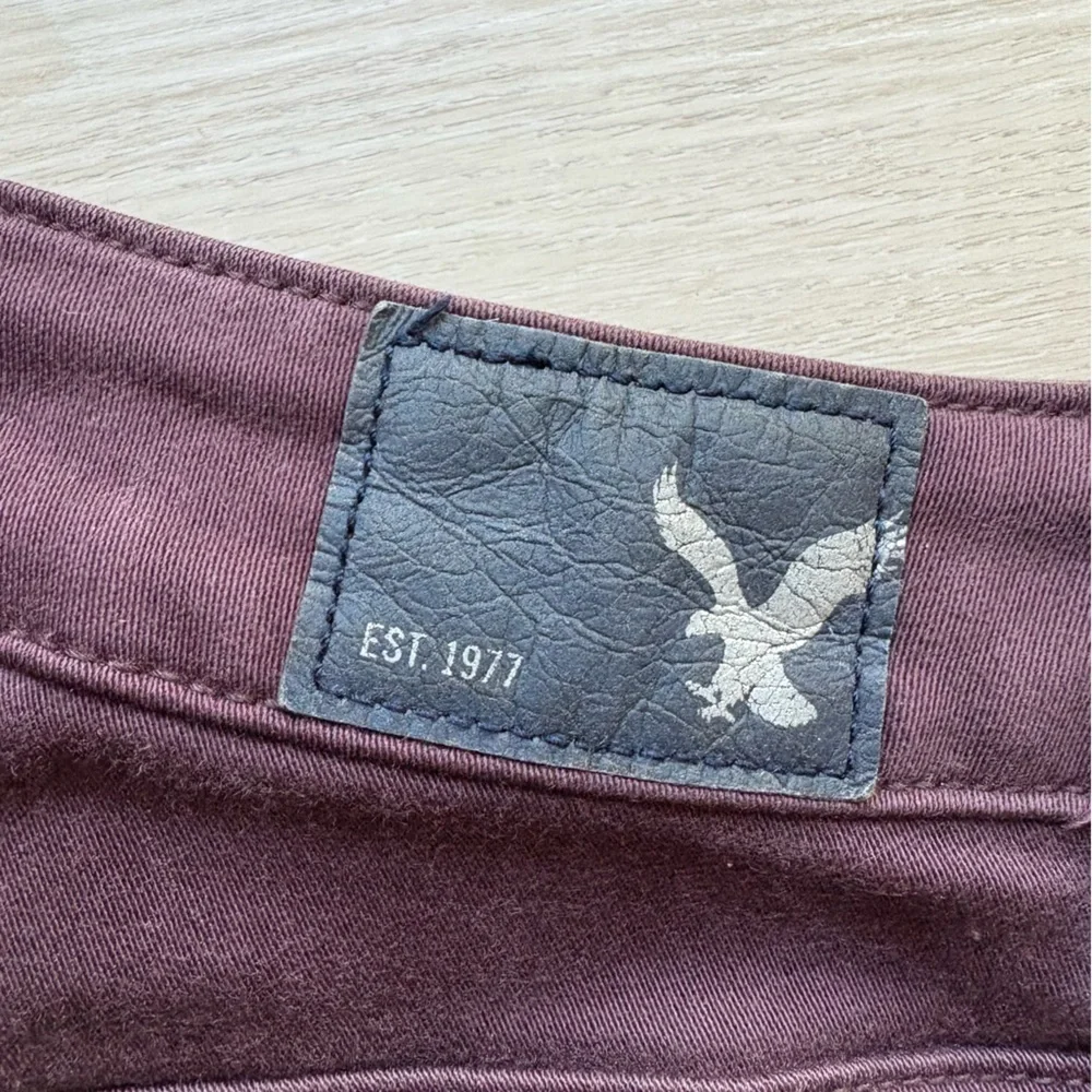 Woman’s American Eagle Outfitters Women's Dark Purple Skinny Jeans